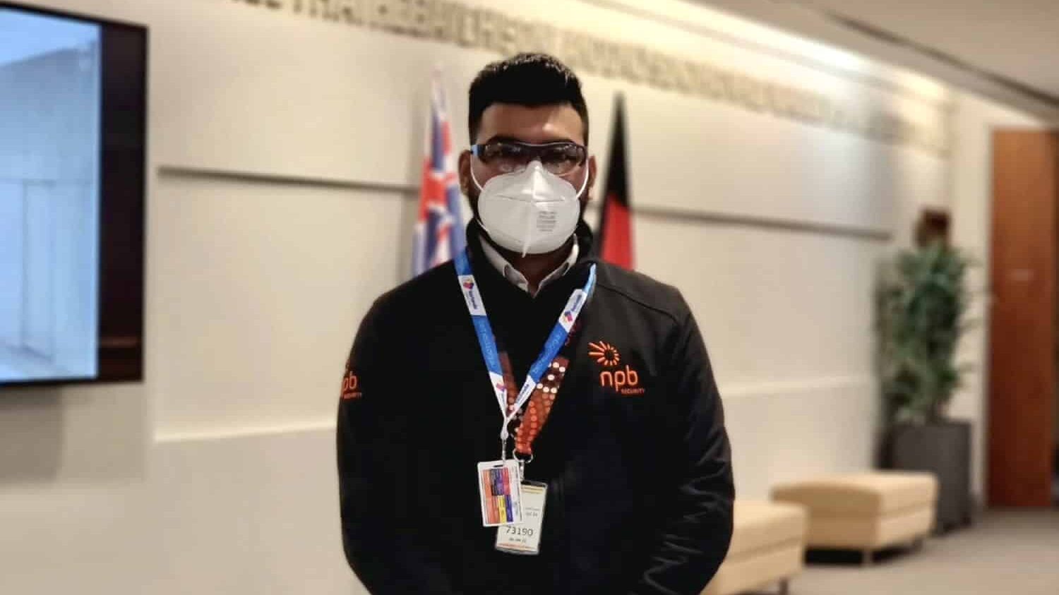 Security guard standing in a hospital entrance
